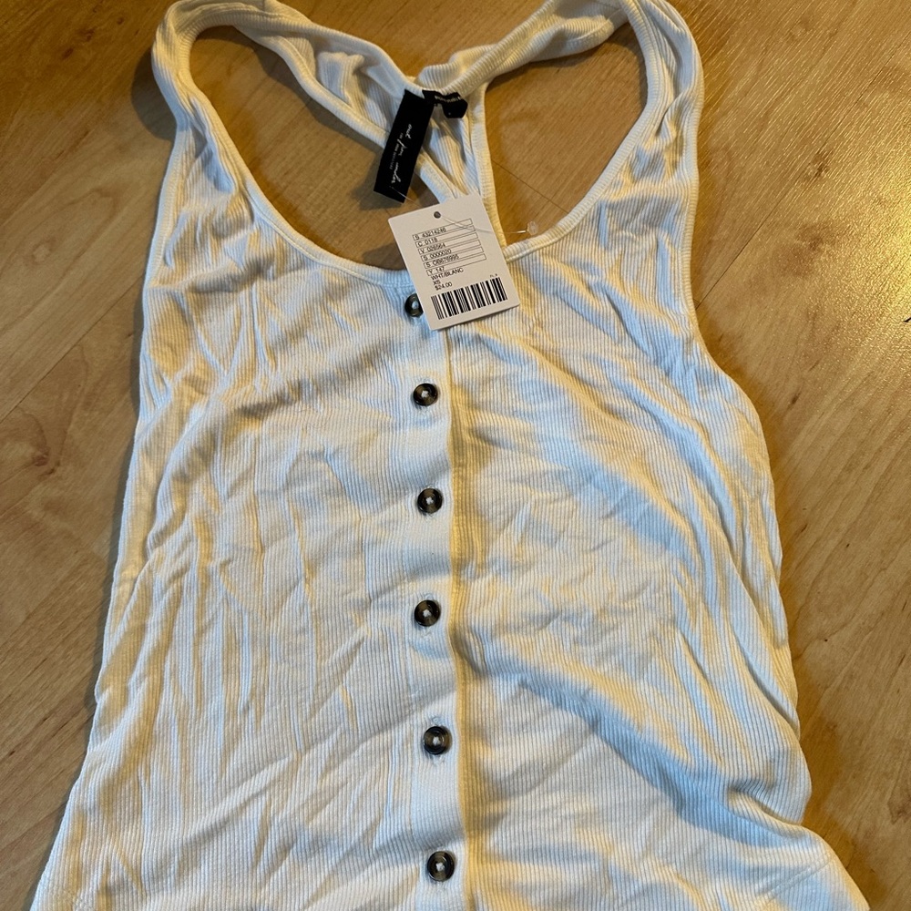 White tank with buttons